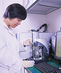 Dr Lu Lin tests the performance of the nano-coating.