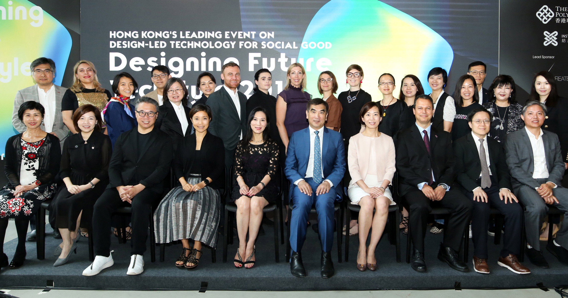 Group photo of the Officiating Guests, speakers of the Symposium, and adjudicators of the International Competition: (Front, from 4th from left) Ms Vanessa CHEUNG, Founder, The Mills and Managing Director, Nan Fung Development Ltd; Ms Jersey YUEN, Assistant Head, CreateHK; The Hon. Felix CHUNG, Member, the Legislative Council; Dr Miranda LOU, Executive Vice President, PolyU; Prof. Naren BARFIELD, Deputy Vice Chancellor and Provost, Royal College of Art.
