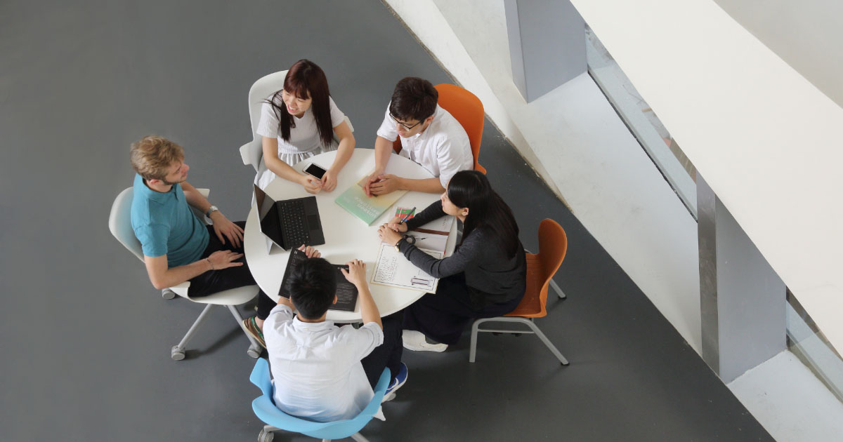 students sitting around the table