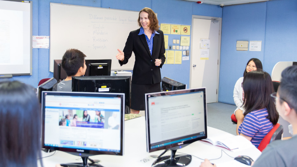 Professor having a lecture in classroom