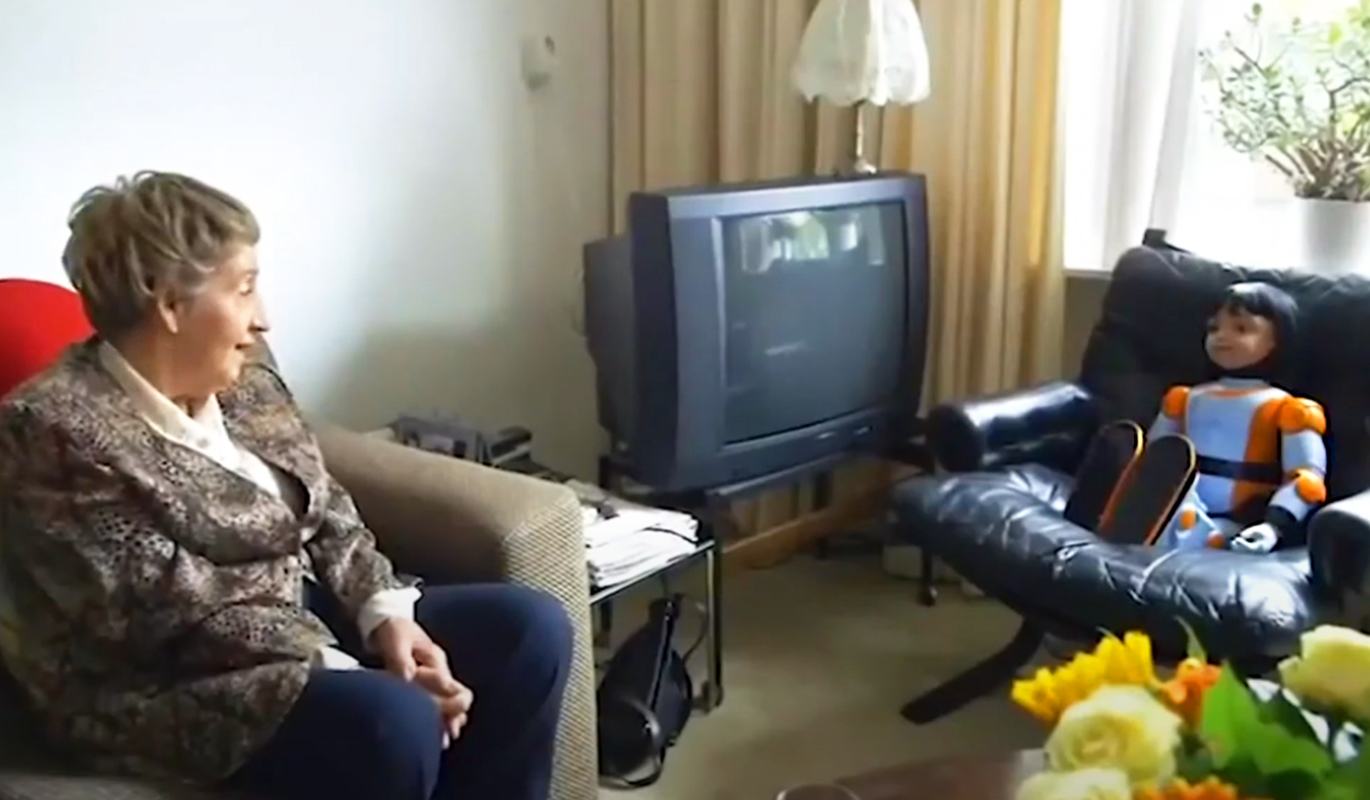 Alice chatting with elderly