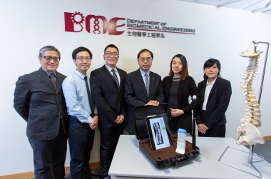 Ir Professor Zheng Yongping and his team with the 3D ultrasound Imaging System