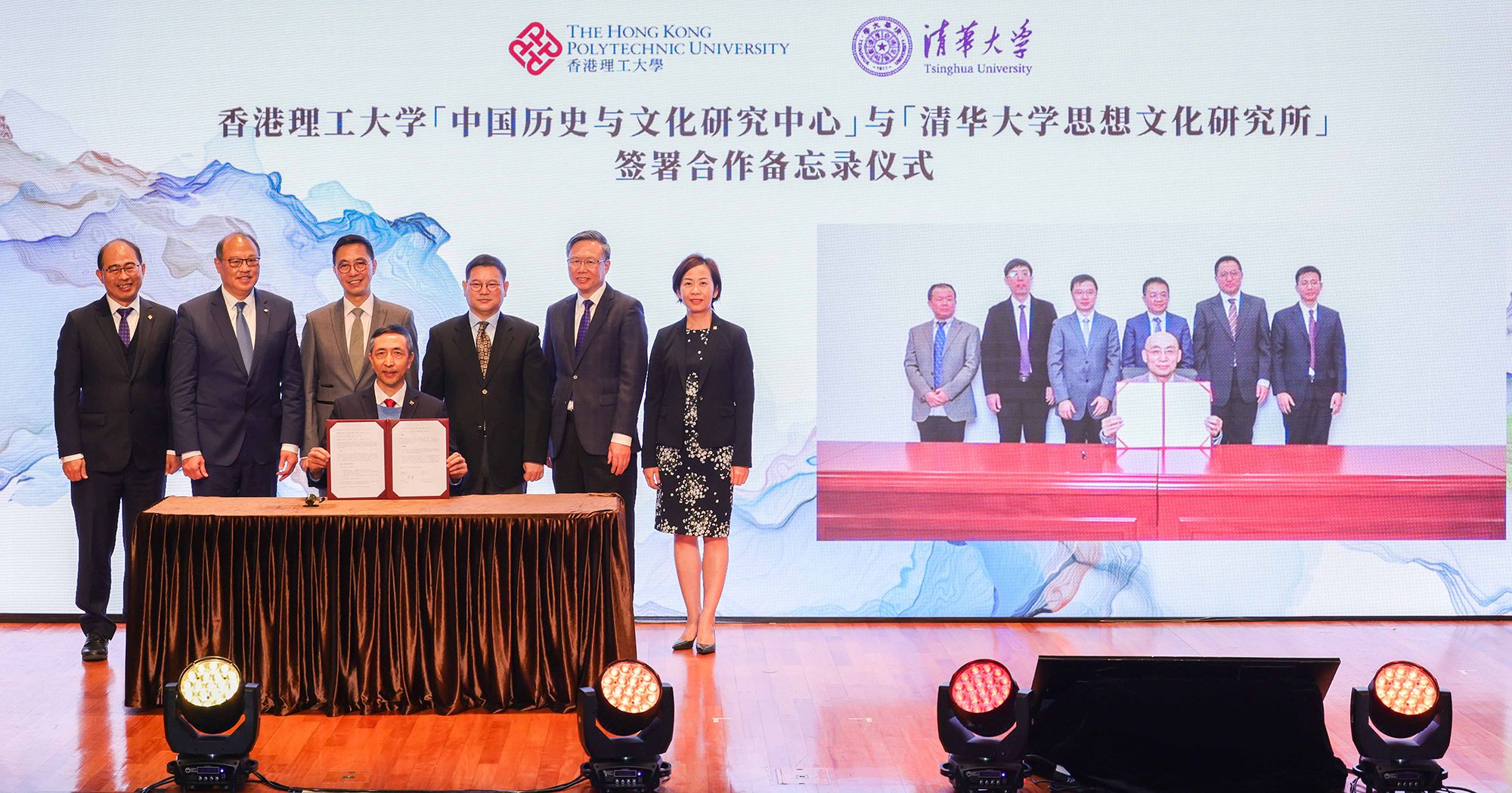 The Research Centre signed an MoU with the Institute of Humanities of Tsinghua University on 17 January 2023. Mr Kevin Yeung (rear, 3rd from left), Mr Zhang Guoyi (rear, 4th from left), and leaders of PolyU and Tsinghua University witnessed the signing by Prof. Li Ping (left, seated) and Prof. Zhong Weimin, Chairman of the Department of History, Tsinghua University (right, seated). PolyU witnesses (rear): Dr Lam Tai-fai (2nd from left), Prof. Jin-Guang Teng (5th from left), Prof. Wing-tak Wong (1st from left), Executive Vice President Dr Miranda Lou (6th from left). Tsinghua University witnesses (rear): Prof. Peng Gang, Vice President (3rd from right); Prof. NI Yuping, Associate Dean of the School of Humanities (4th from right), and the Department of History’s Prof. A Feng (2nd from right), Dr Gu Tao (5th from right), Dr Sun Zhengjun (1st from right), and Dr Huang Zhengping (6th from right).