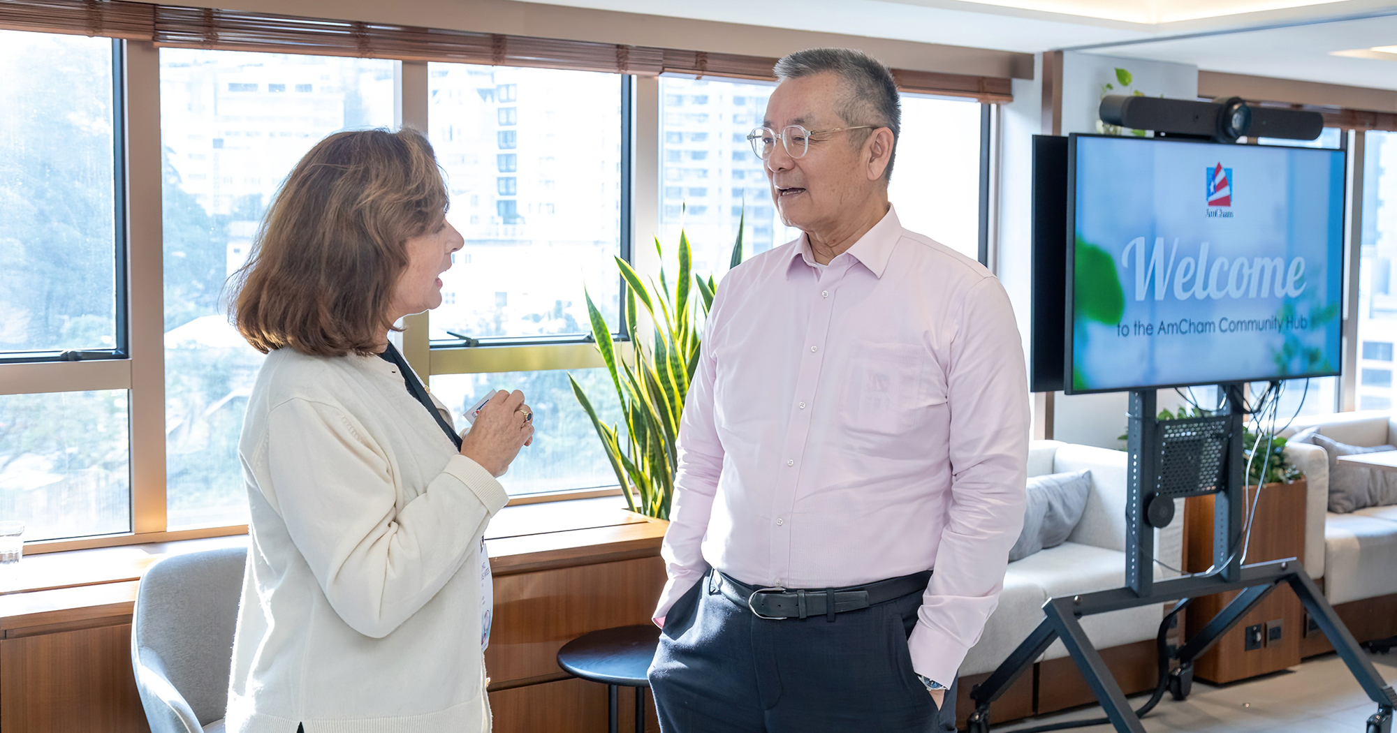 Dr Eden Woon, President of the American Chamber of Commerce in Hong Kong (right)