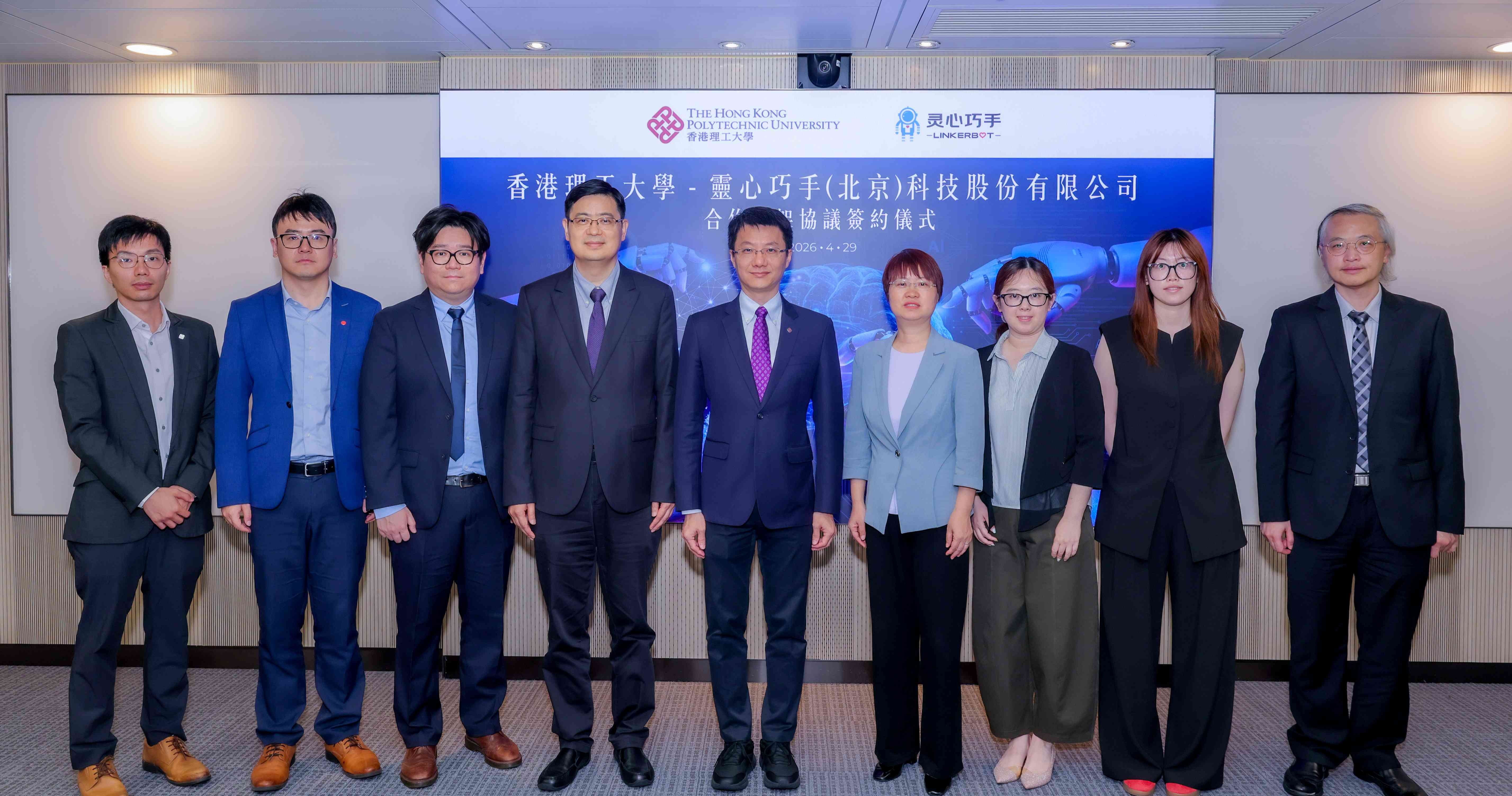 Prof. Zheng Zijian (centre), Ms Zuo Jiaping (4th from right), Prof. Xiaowen Fu, Chair Professor of Logistics Engineering and Head of the PolyU Department of Industrial and Systems Engineering (4th form left), together with PolyU scholars who will participate in the collaborative projects including Prof. Lik-Hang Lee, Assistant Professor of the Department of Industrial and Systems Engineering (3rd from left); Prof. Zheng Pai, Wong Tit Shing Young Scholar in Smart Robotics and Associate Professor of the Department of Industrial and Systems Engineering (2nd from left); and Dr Cheung Chung-wai, Research Assistant Professor of the Department of Biomedical Engineering (1st from right), as well as Ms Ma Nan, Head of Linkerbot research outreach division (3rd from right), Ms Ji Yuanyuan, Manager of  Linkerbot research outreach division (2nd from right), and Mr Samuel Yeung, Senior Manager of the PolyU Research and Innovation Office (1st from left), posed for a group photo at the signing ceremony.