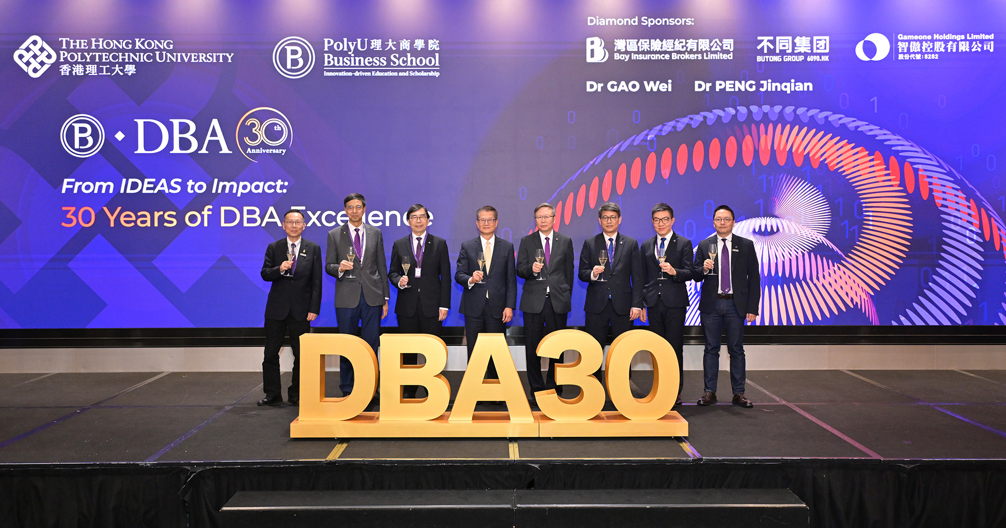 The PolyU Faculty of Business hosted a grand dinner on 14 May to celebrate the 30th anniversary of its DBA programme. In attendance were: Mr Paul Chan, Financial Secretary of the HKSAR Government of the People’s Republic of China (4th from left); Prof. Jin-Guang Teng, PolyU President (4th from right); Prof. Christopher Chao, Senior Vice President (Research and Innovation) (3rd from right); Dr Ben Lau, PolyU Interim Vice President (Campus and Facilities) (2nd from right); Prof. Geoffrey Shen, PolyU Associate Vice President (Global Partnerships) (2nd from left); Prof. Edwin Cheng, Dean of the PolyU Faculty of Business (3rd from left); Prof. Yick-hin Hung, PolyU DBA Programme Director (1st from left); and Prof. Raymond Wong, PolyU DBA Deputy Programme Director (1st from right).
