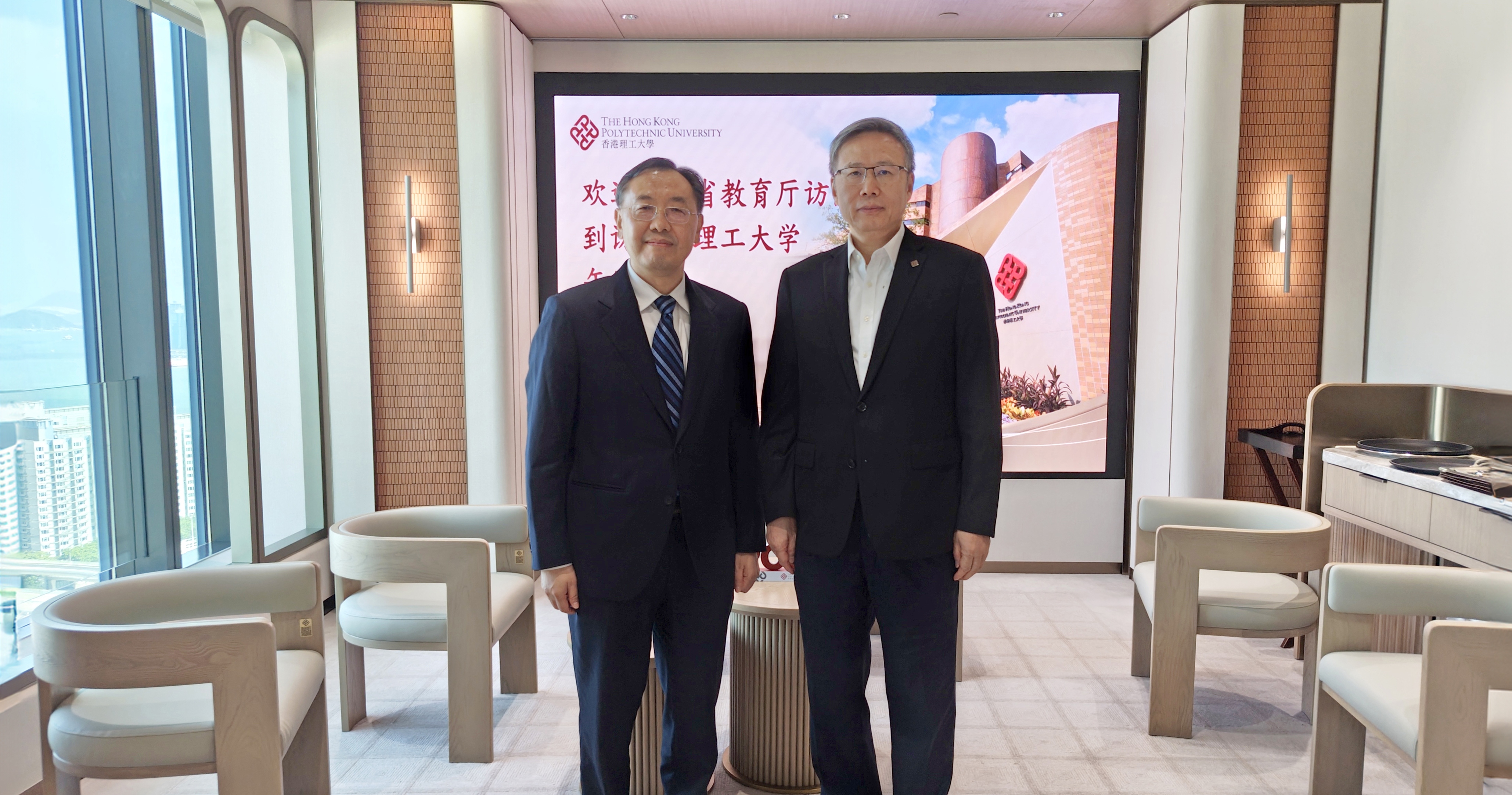 滕錦光教授（右）與張瀾濤先生（左）。
