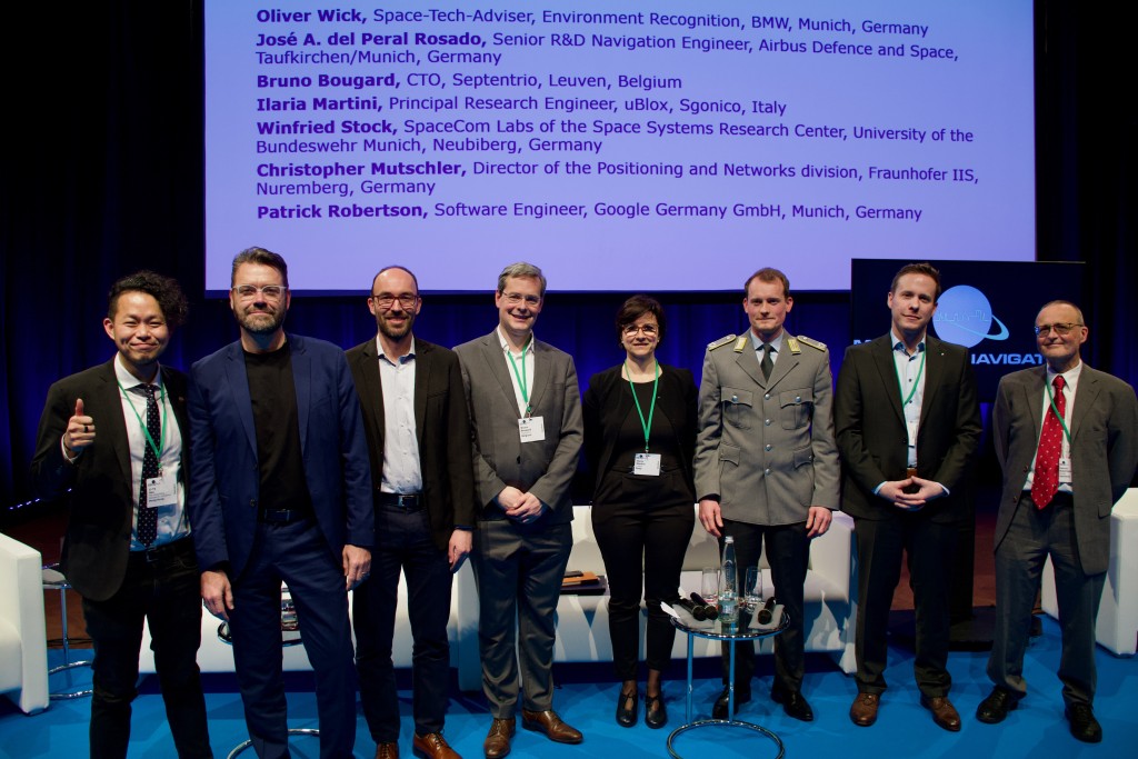 Panel group photo: 8-person panel of “Innovations Driven by Multi-Layer PNT” chaired by Prof. Hsu
