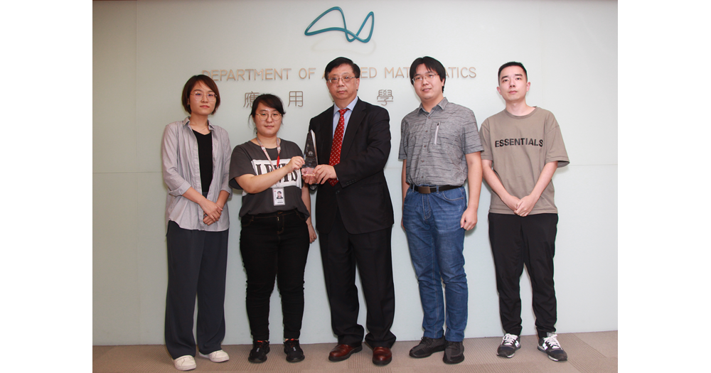 Prof Sun  his team received the award from Dr Huiling Zhen the representative of Huawei Technologies