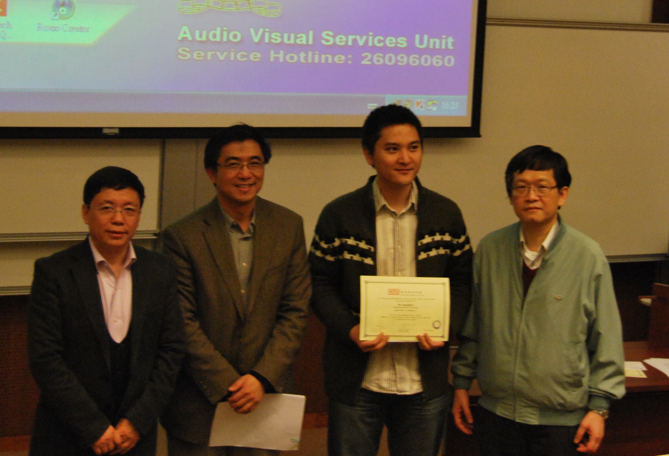 Huihui ZENG (CUHK; Best Thesis Winner), Prof. Tao Tang (HU’s supervisor), Guanghui HU (BU; Applied Math Best Thesis Winner), Prof. Zhouping XIN (ZENG's supervisor) (from left to right)
