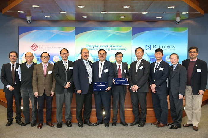 Group photo of the signatories of the agreement and other guests