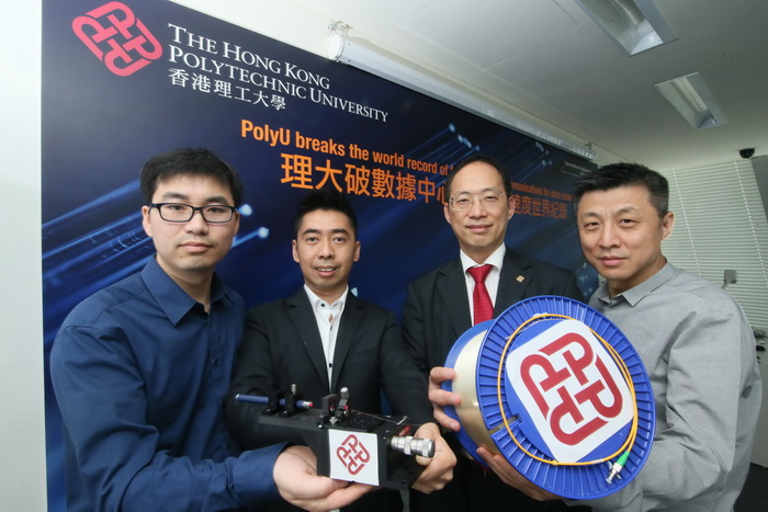 Research Team: Prof. Alex Wai (middle), Prof. Chao Lu (right), Dr. Alan Lau (second from the left), and Dr. Kangping Zhong (first from the left), Post-doctoral fellow. 