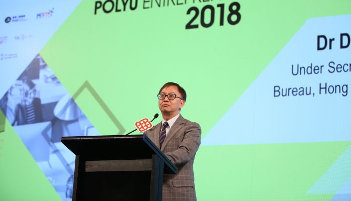 Dr David Chung, Under Secretary for Innovation and Technology, officiates at the opening ceremony of PolyU Entrepreneurship Parade 2018
