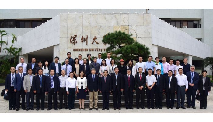 The signing ceremony at Shenzhen University is well attended by various officials and representatives from the 12 universities and institutions.