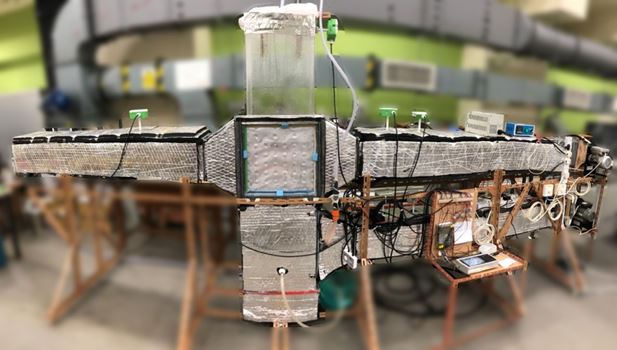 A test facility of Indirect Evaporative Cooling systems
