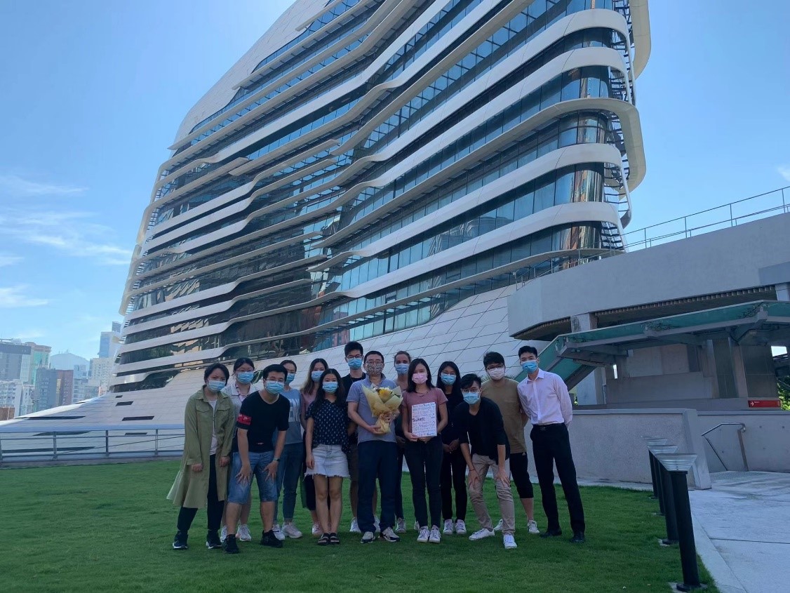 Dr. Chunyi Wen (Third from the right in the first line) and his research team at the Jockey Club Innovation Tower