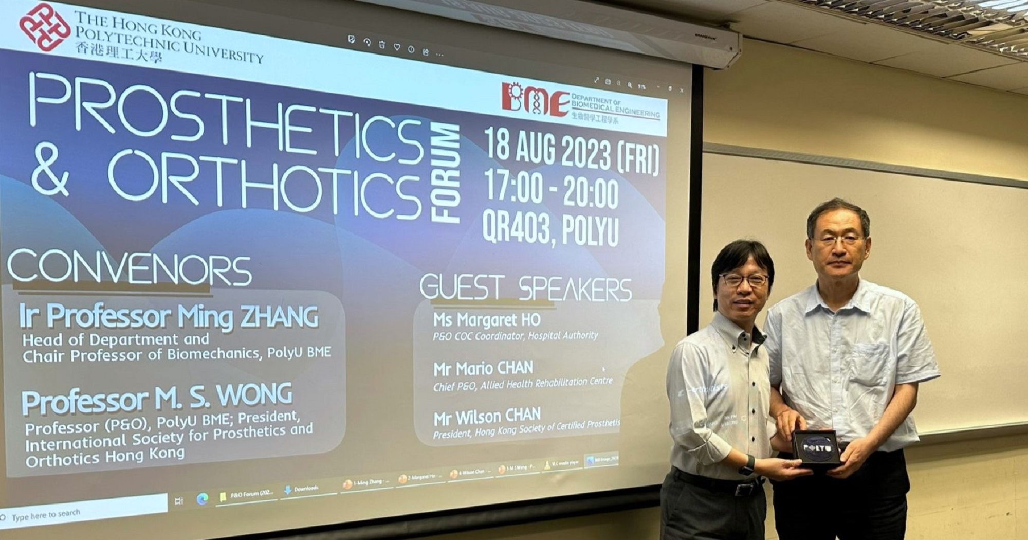 Prof. Ming Zhang presented souvenir to speaker Mr Wilson Chan, President of the Hong Kong Society of Certified Prosthetist-Orthotists (HKSCPO)