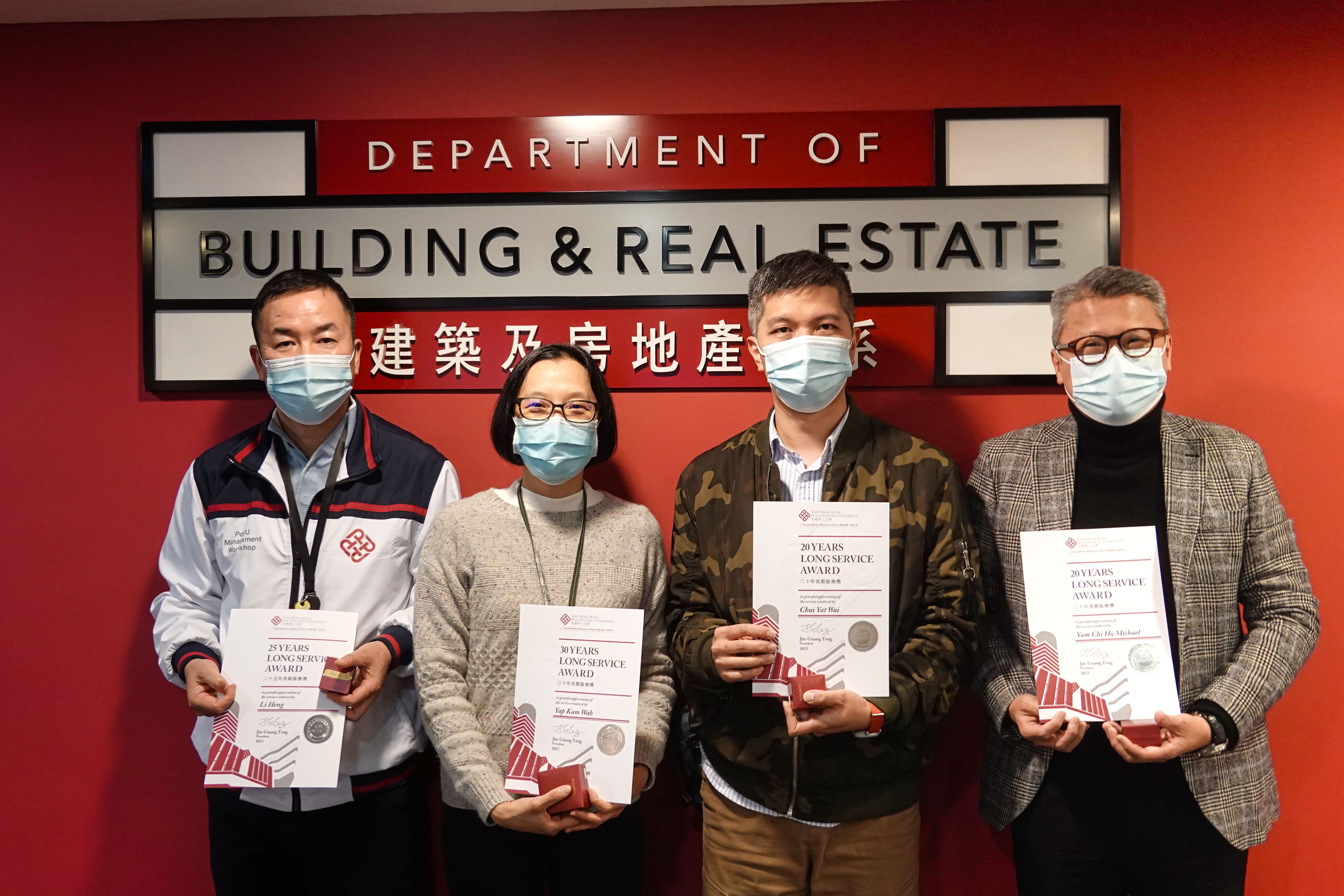 Four awardees including Head 20 years