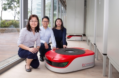 Dr Carmen Lee with the industrial IoT-based smart robotic logistics management system