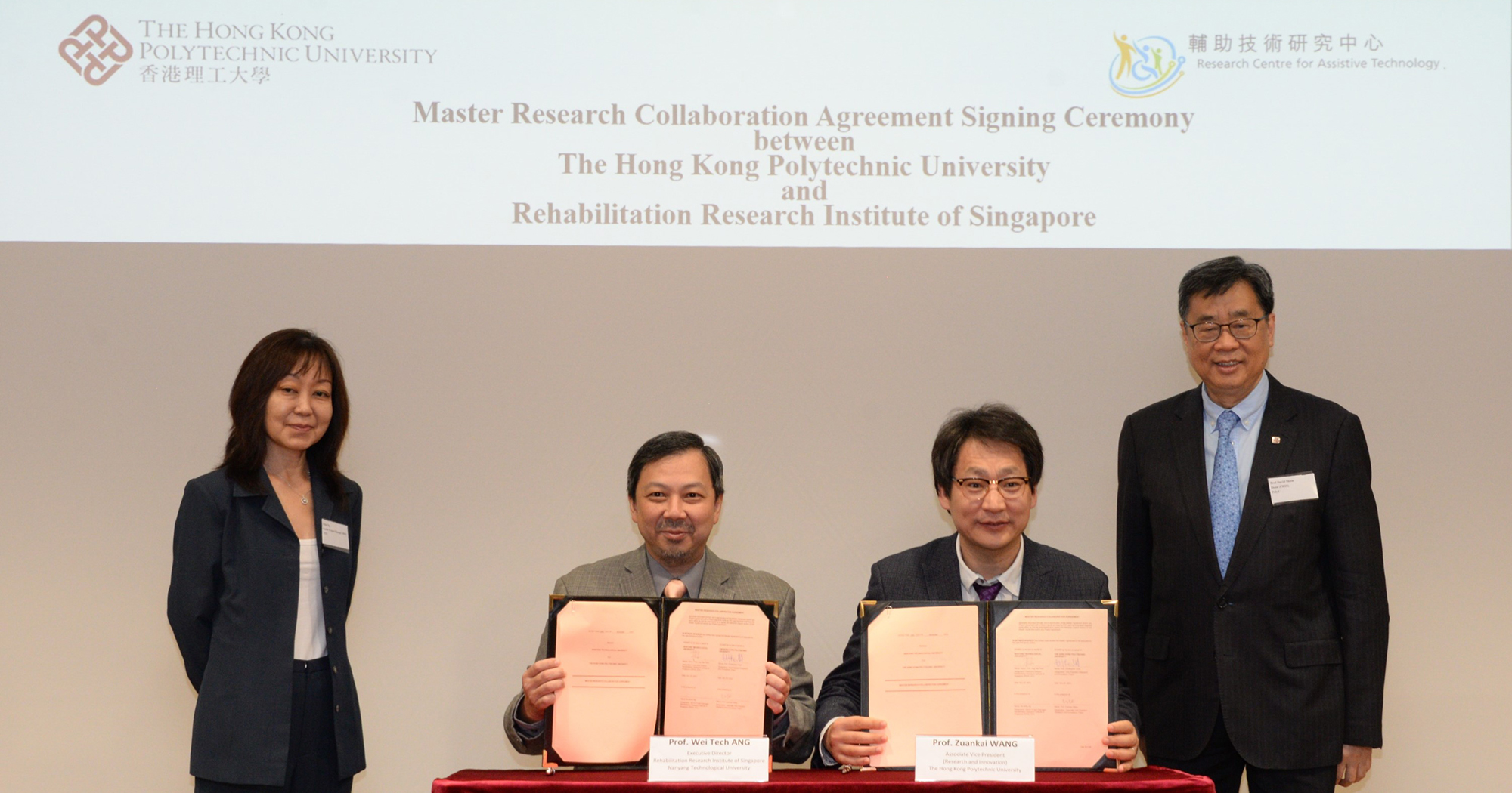 Witnessed by Prof. Zuankai WANG, Associate Vice President (Research and Innovation) (2nd from right) and Prof. David SHUM (1st from right) , Dean of Faculty of Health and Social Sciences, PolyU, and Ms Milie NG, Senior Project Manager, Rehabilitation Research Institute of Singapore of Nanyang Technological University (NTU) (1st from left), the Master Research Collaboration Agreement was signed by Prof. Christopher CHAO, Vice President (Research and Innovation), PolyU and Prof. Wei Tech ANG, Executive Director, RRIS, NTU (2nd from left).