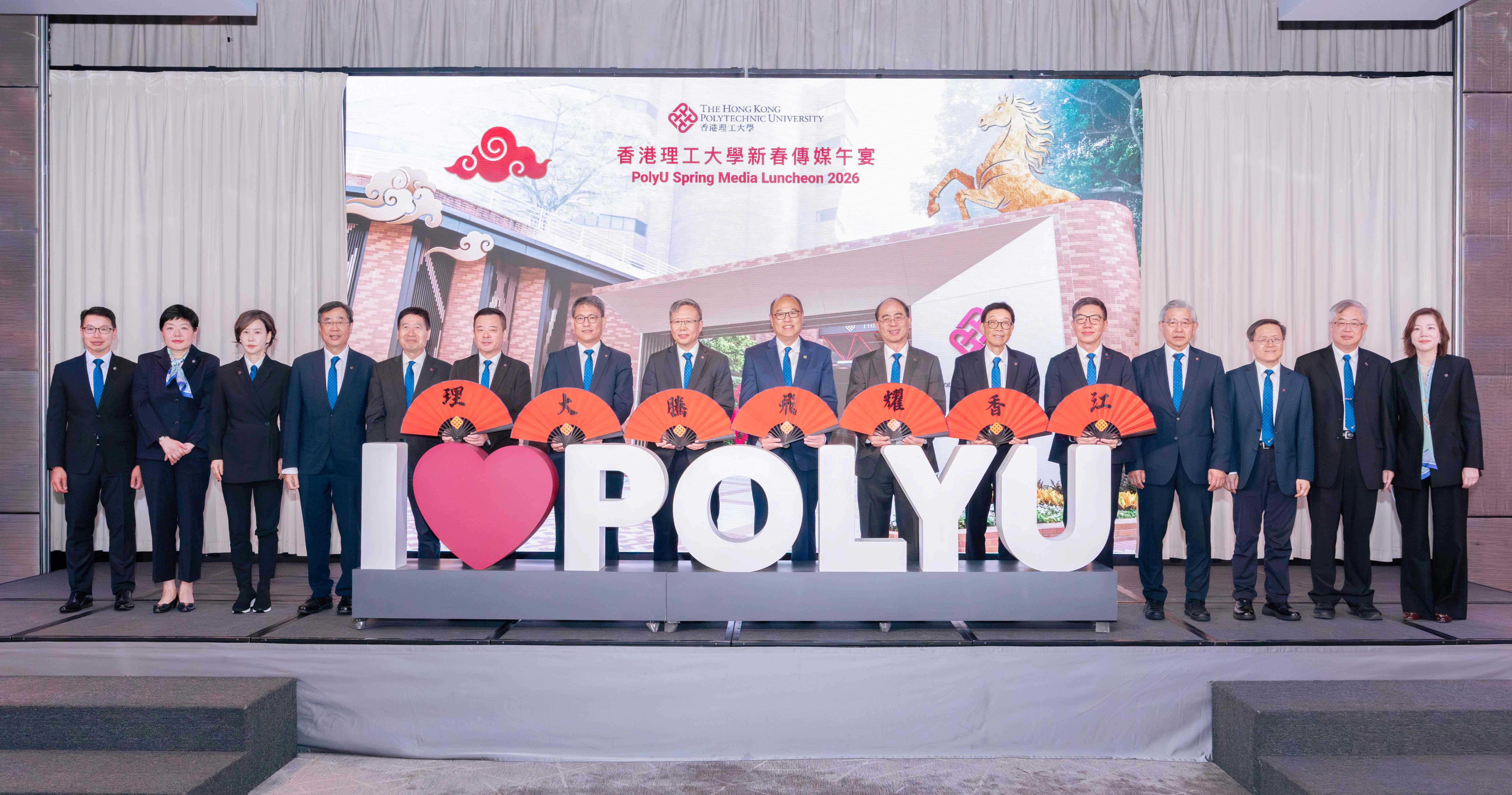 The Spring Media Luncheon was attended by PolyU’s management team members, deans and directors, including Dr Lam Tai-fai, PolyU Council Chairman (8th from right), Prof. Jin-Guang Teng, President (8th from left), Prof. Wing-tak Wong, Deputy President and Provost (7th from right); Prof. Christopher Chao, Senior Vice President (Research and Innovation) (7th from left); Prof. Cao Jiannong, Vice President (Education) (6th from right); Prof. Ben Young, Vice President (Student and Global Affairs) (6th from left); Dr Ben Lau, Interim Vice President (Campus and Facilities) (5th from right); Prof. Li Xiangdong, Dean of the Faculty of Construction and Environment (5th from left); Prof. H.C. MAN, Dean of the Faculty of Engineering (4th from right); Prof. David Shum, Dean of the Faculty of Health and Social Sciences (4th from left); Prof. Raymond Wong, Dean of the Faculty of Science (3rd from right); Prof. Erin Cho, Dean of School of Fashion and Textiles (3rd from left); Prof. Chen Changwen, Interim Dean of the Faculty of Computer and Mathematical Sciences (2nd from right); Dr Lu Qiaomei, Director of CIHK (2nd from left); Mr Ian Lee, General Manager of Hotel ICON, a teaching and research hotel wholly owned by PolyU (1st from left); and Ms Priscilla Hung, Director of Communications and Public Affairs (1st from right).