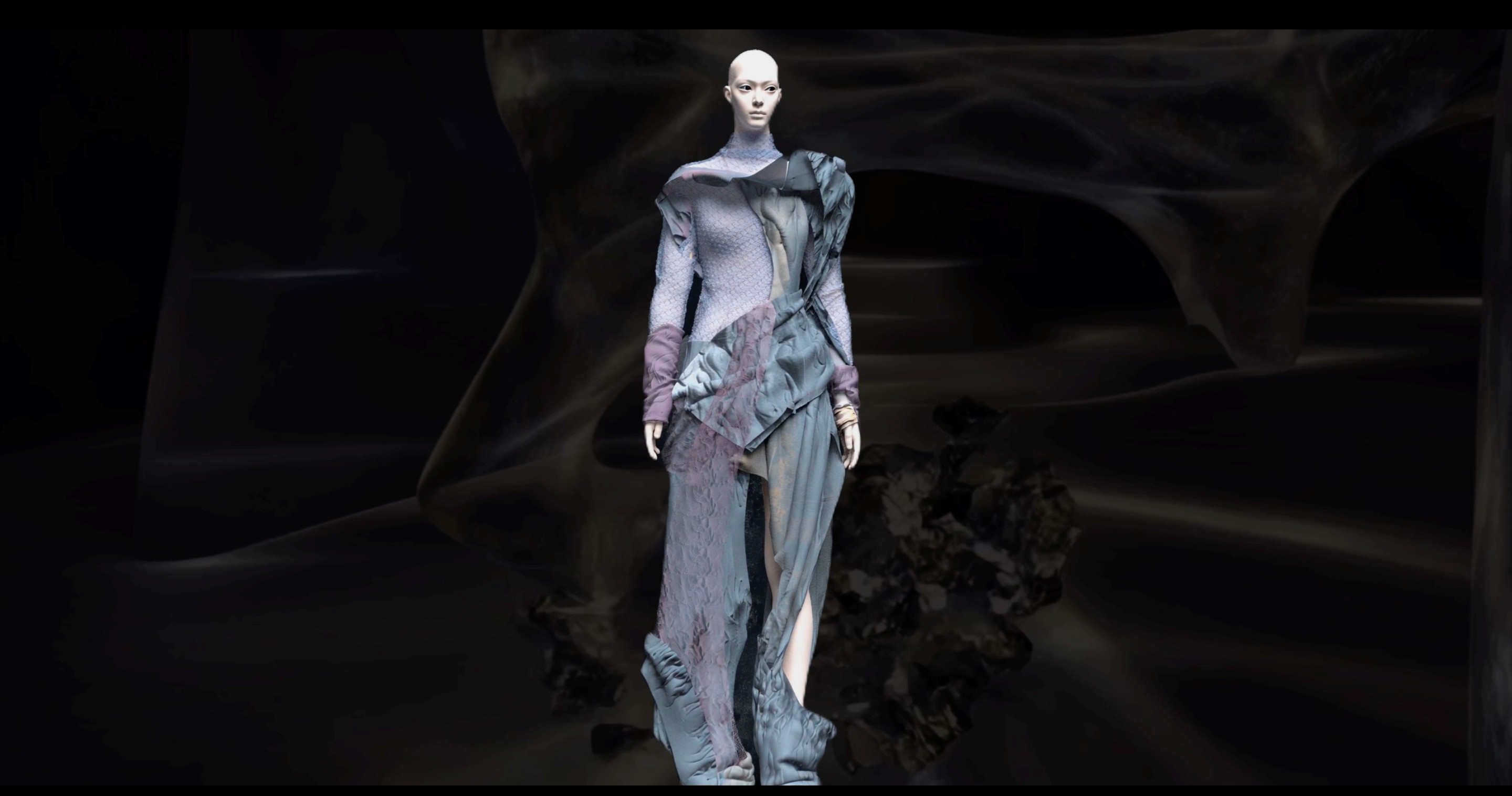 The first digital collection of the MA Graduate Fashion Show, titled “Digital Scars”, by Gabbi SHI Chang was inspired by contemporary society’s diminishing capacity for emotional expression and vulnerability. Using advanced digital software, Gabbi explored how inner feelings could be embraced and made visible on the body. The result was a dynamic presentation of clothing that transformed into sculptural forms that could only exist in the virtual world.