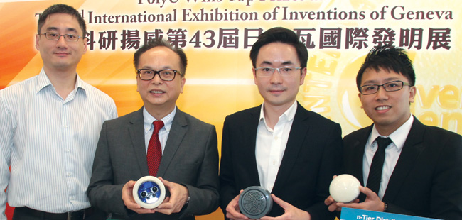 Dr Andrew W.H. Ip (second from left) and his research team members display the sensors and connectors of the system.