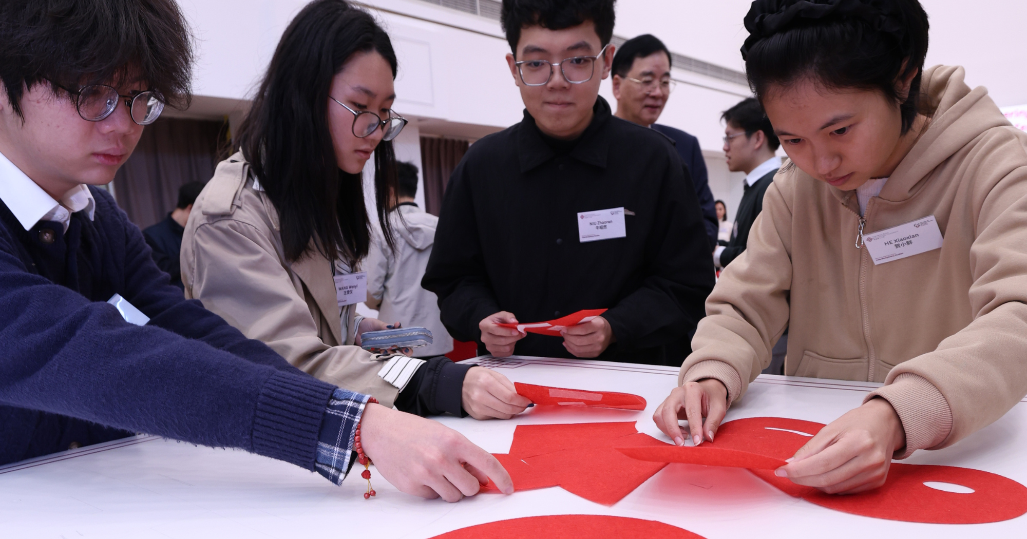 Celebrating Chinese New Year together, BDSIS students and professors collaborate to create a festive “福” character collage at the conclusion of the event.