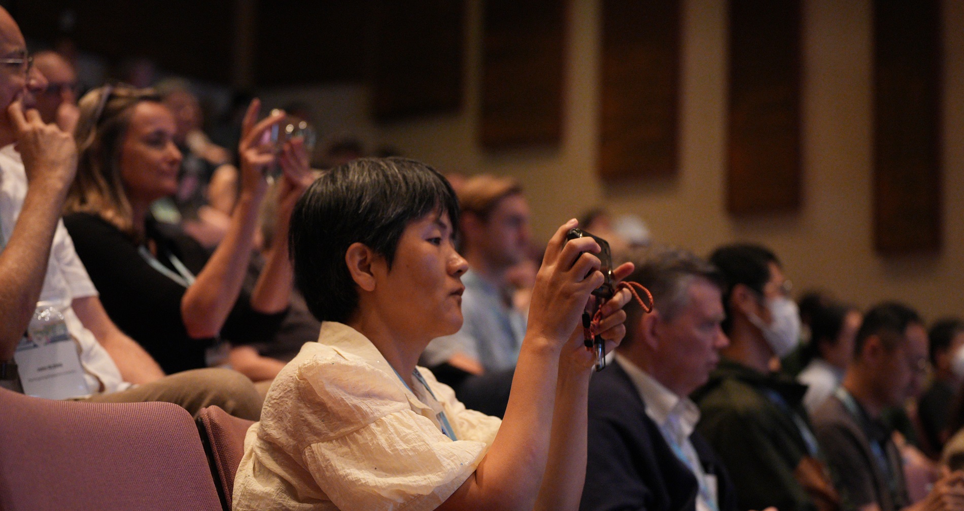 A packed Chiang Chen Studio Theatre pays close attention to the speech