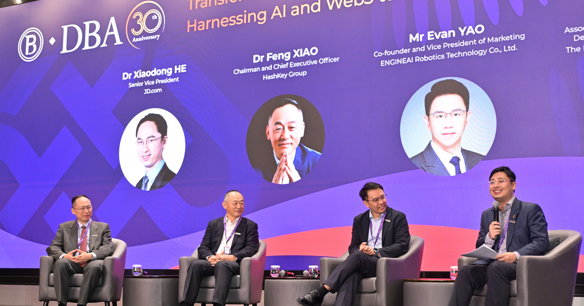From left to right: Dr Xiaodong HE, Senior Vice President, JD.com; Dr Feng XIAO, Chairman and Chief Executive Officer, HashKey Group; Mr Evan YAO, Co-founder and Vice President of Marketing, ENGINEAI Robotics Technology; and Prof. Jimmy JIN, Associate Dean (External Relations and Development), PolyU Business School.