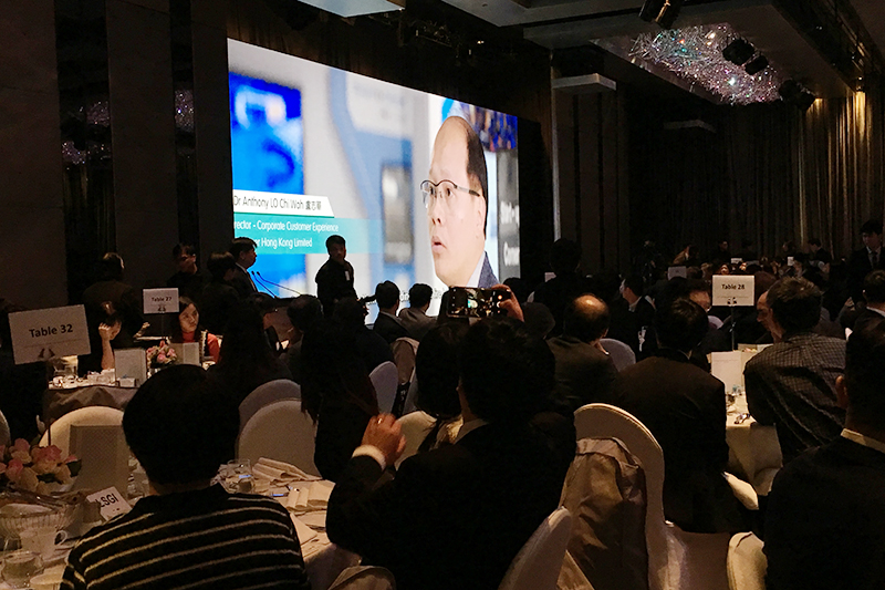 The guests watching a video featuring Ir Dr Lo