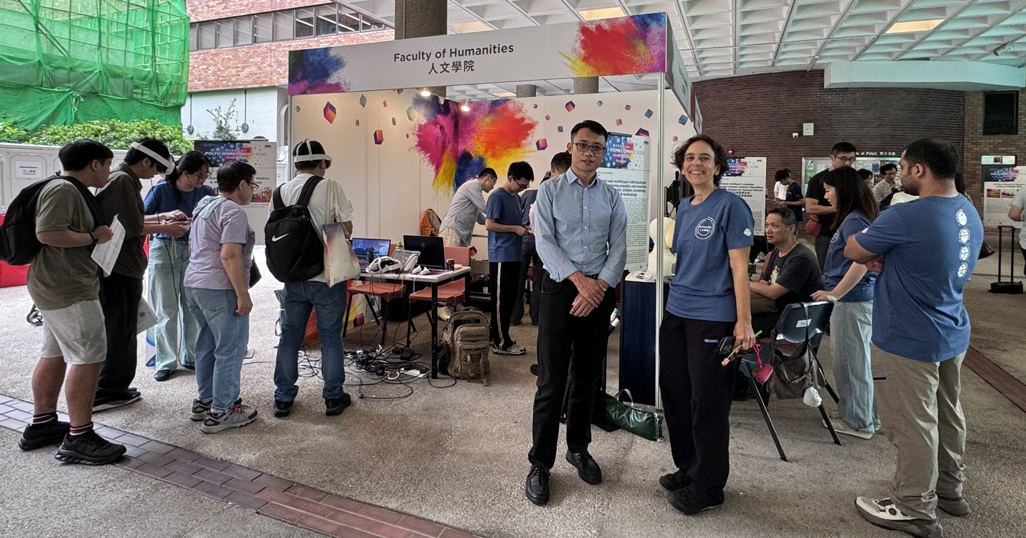 Prof. William FENG, Associate Dean (left) and Prof. Renia LOPEZ, Assistant Dean (right) of Faculty of Humanities support the FH showcase.