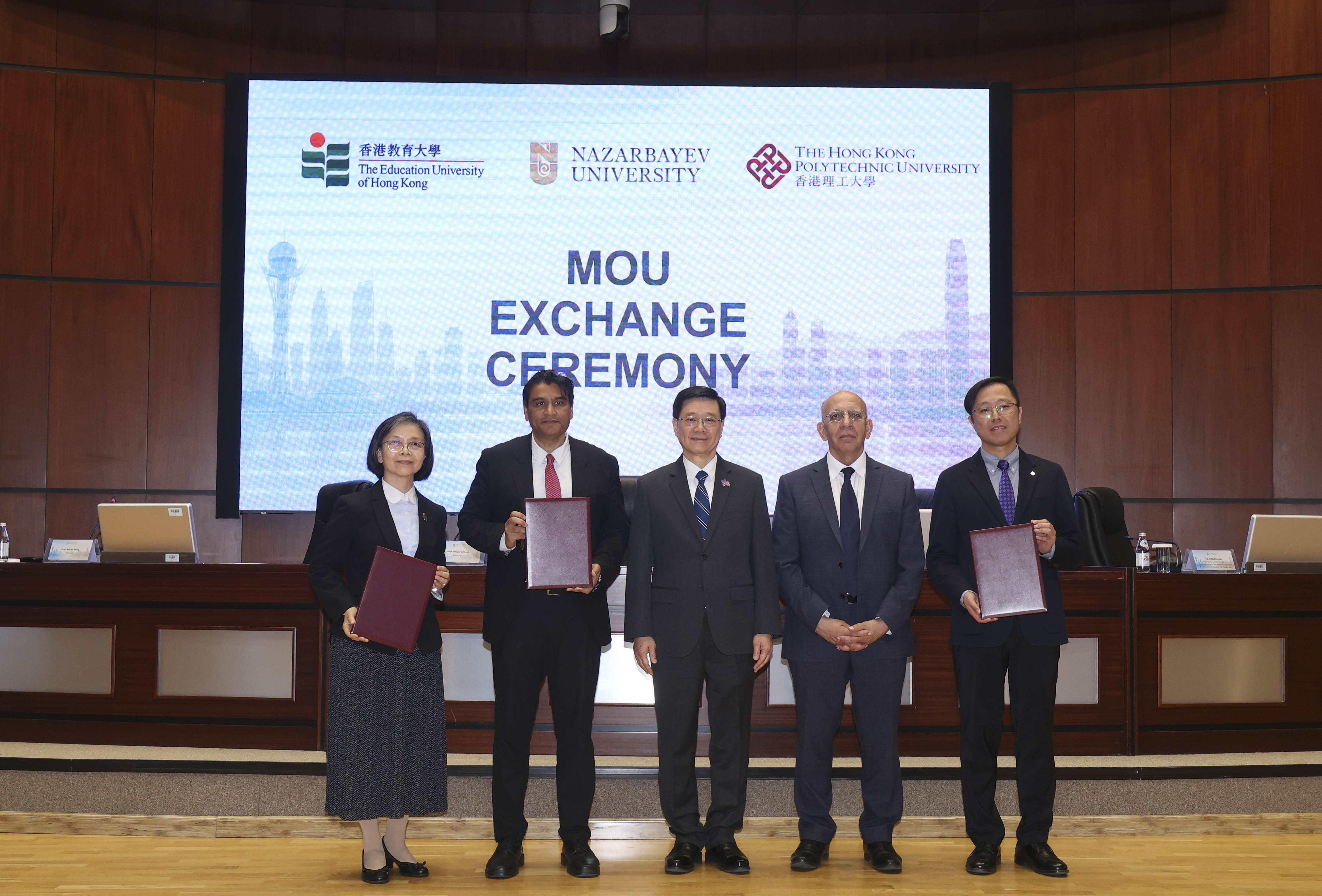 Prof. Raymond Sze, Associate Dean of the Faculty of Computer and Mathematical Sciences (1st from right), represented PolyU to exchange Memorandum of Understanding(MoU) with Nazarbayev University, witnessed by Mr John Lee, the Chief Executive of the HKSAR (centre) and Prof. Waqar Ahmad, President of Nazarbayev University (2nd from right).