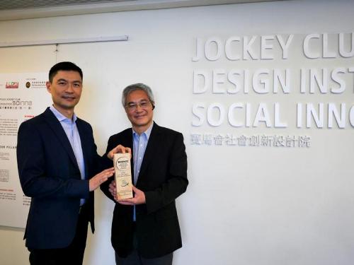 Presenting Bronze Award to Jockey Club Design Institute for Social Innovation