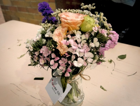 Donated flowers are repurposed into micro-bouquets