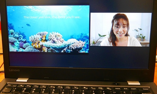 Speaker talking about the lovely coral reefs in Hong Kong