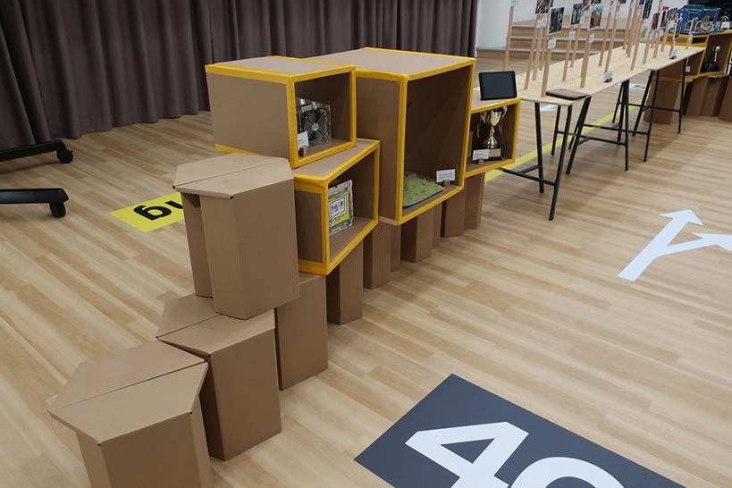 Paper carton chairs obtained through the ResourcesSharing@PolyU platform were reused at exhibitions