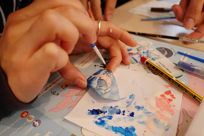 Participants upcycled sea glass to accessories and turned used car tires into luggage tags