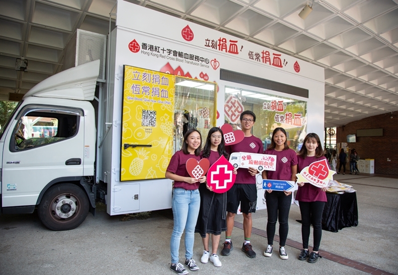 Students donating blood in the new blood donation vehicle Students donating blood in the new blood donation vehicle