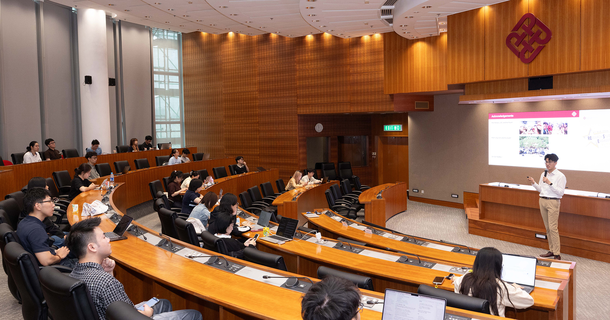 Student engages the audience with his research presentation