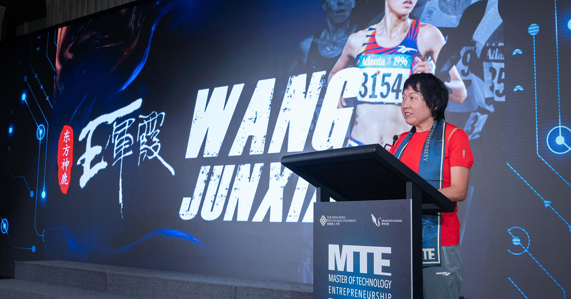 Ms WANG Junxia, China's first Olympic long-distance running champion shares on stage
