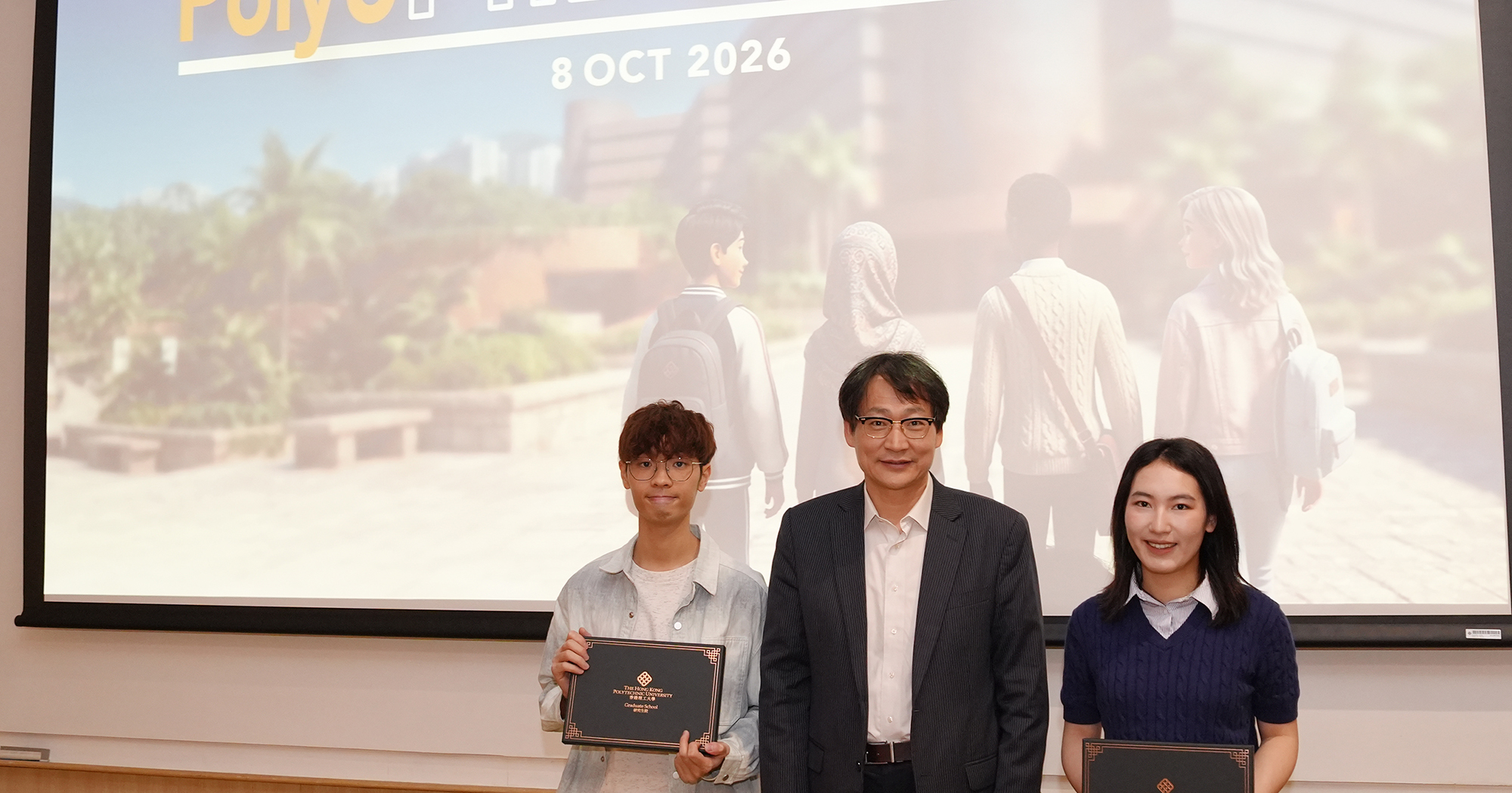 Prof. WANG Zuankai (centre), Dean of the Graduate School, with student speakers Mr Harry Liu (left), a PhD student from the School of Optometry, and Ms Lisa Gu (right), a PhD student from the Department of English and Communication.