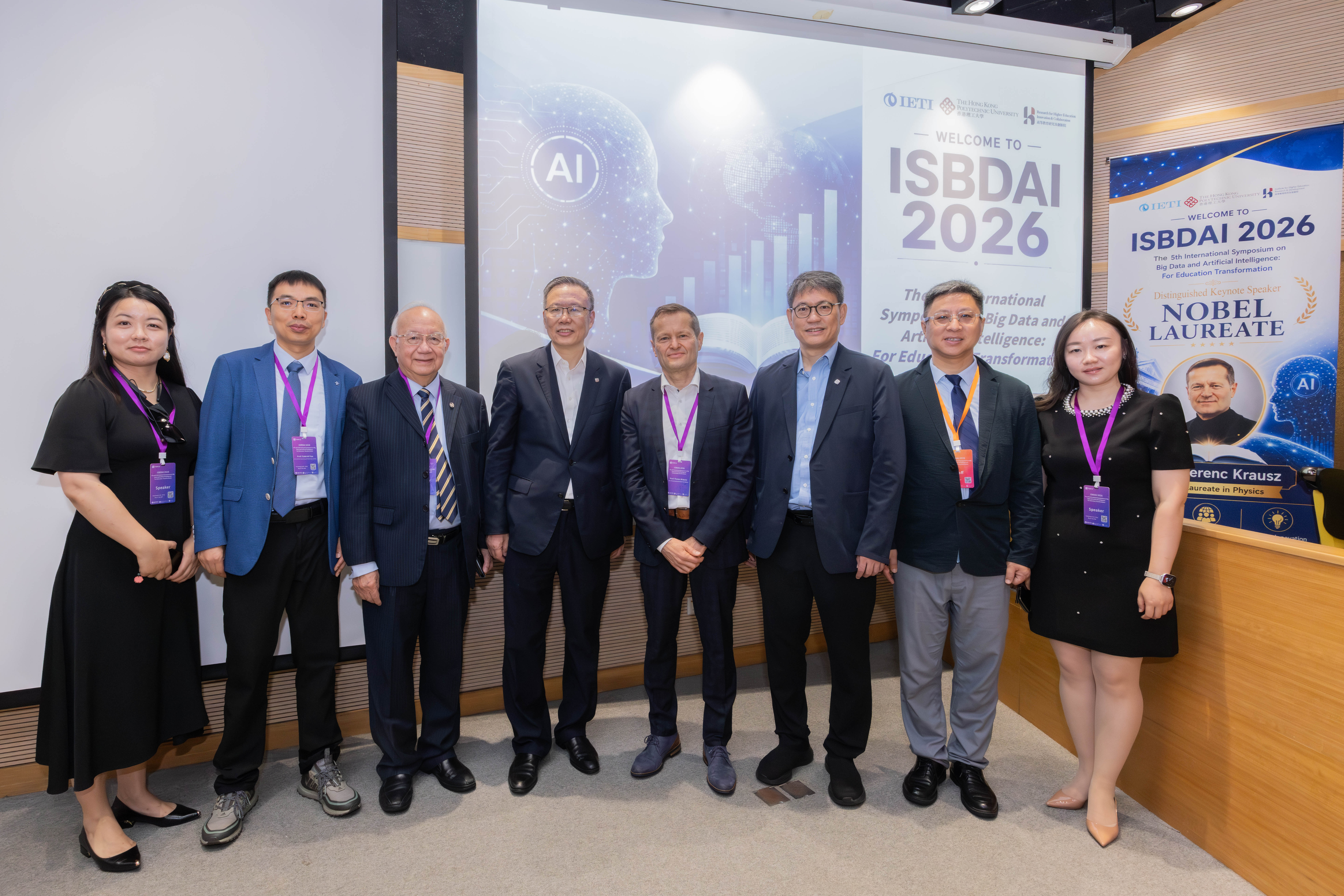 Group photo with Prof. Jin-Guang TENG, President (fourth from left), Prof. Christopher CHAO, Senior Vice President (Research and Innovation) (third from left), Prof. Ferenc KRAUSZ, Nobel Laureate in Physics (fourth from left) and other guests at ISBDAI 2026