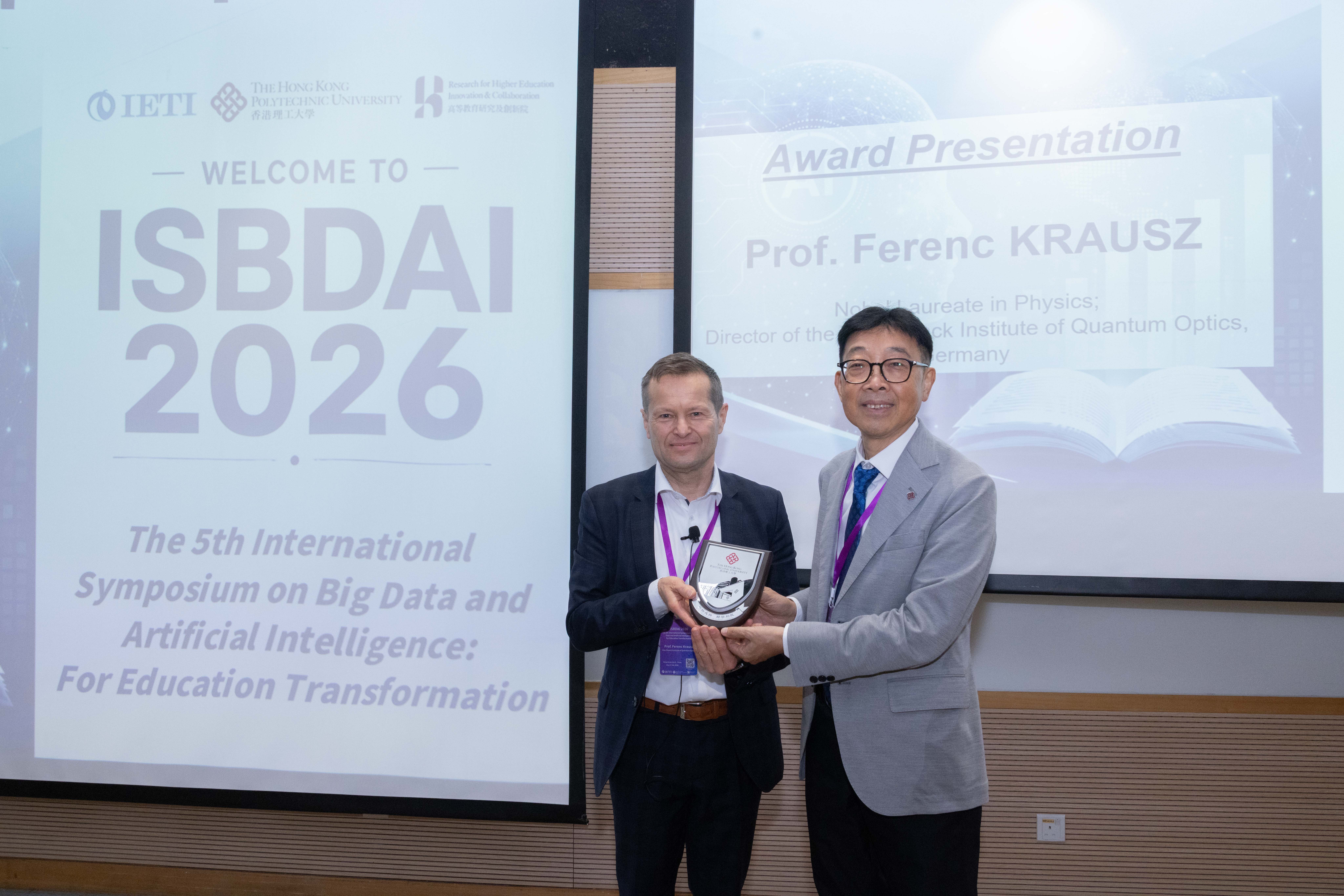 Prof. CAO Jiannong, Vice President (Education) and Director of IHERD presents souvenir to Prof. Ferenc KRAUSZ