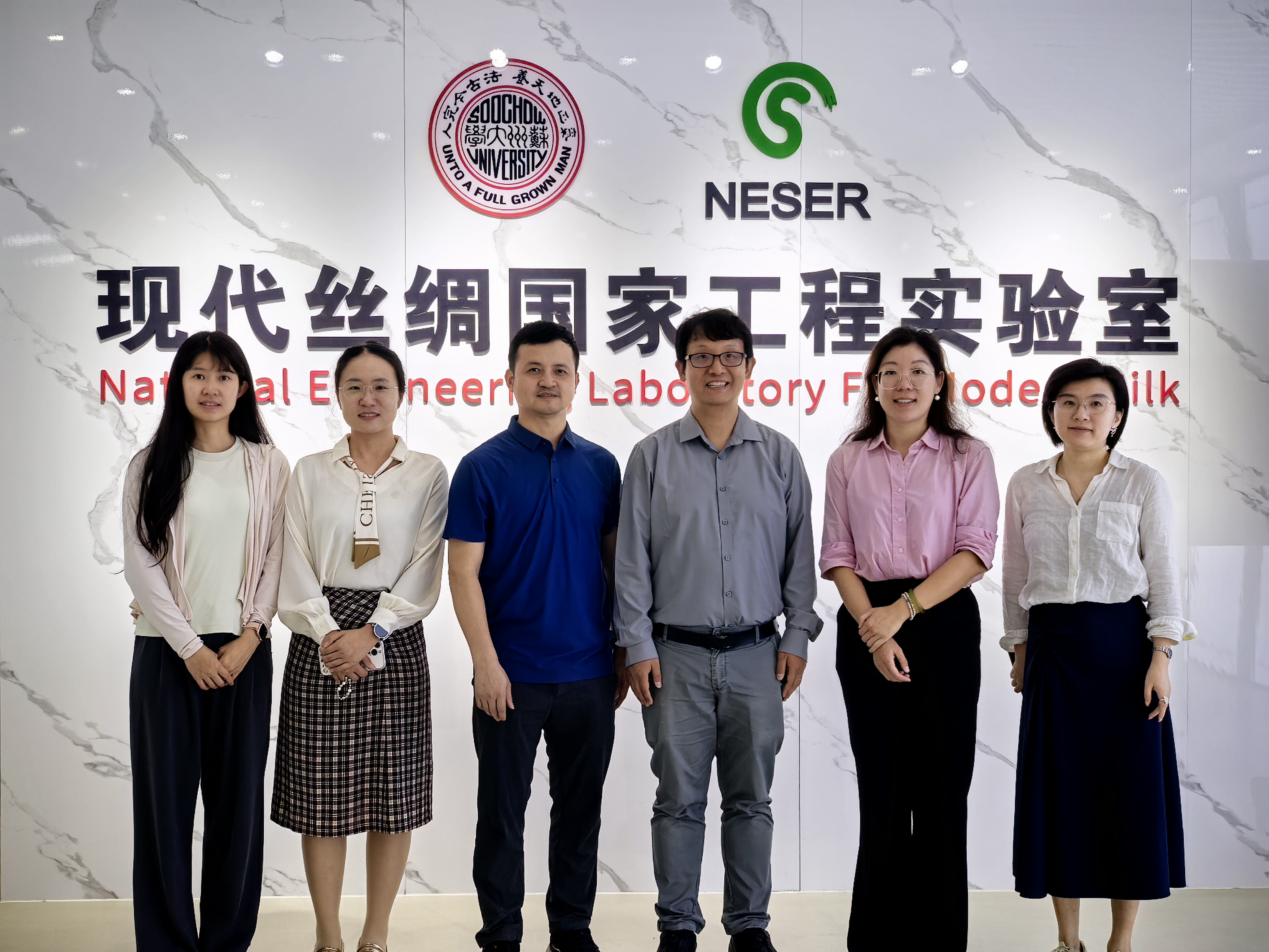 Group photo of JCTC PolyU Delegation with the representatives of National Engineering Laboratory for Modern Silk (NESER), Soochow University. (From Left) Ms. Wang Huiyun, Academic and Scientific Research Secretary, Soochow University; Dr. Wang Lijun, Postdoctoral Fellow, Soochow University; Prof. Li Gang, Assistant Director of NESER, Professor, Soochow University; Prof. Hang Xing,  Co-Director of JCTC, Associate Dean (Global Engagement) of Faculty of Humanities, Professor, PolyU; Dr. Feng Qilong, Research Assistant Professor, PolyU; Dr. Shi Liu, Research Assistant Professor, PolyU.