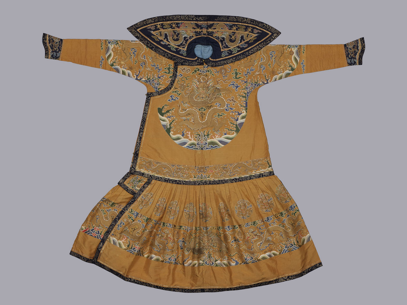 Court robe with dragons and clouds; Qing dynasty, Yongzheung period (1723-1735); Brocaded gauze, polychrome and metallic-wrapped silk threads; The Chris Hall Collection at the Hong Kong Palace Museum, 2024.CH-HKPM.8; © Hong Kong Palace Museum