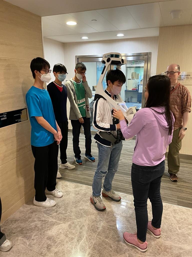 Students tried to use backpack mobile mapping system with the assist of staffs form Survey and Mapping Office