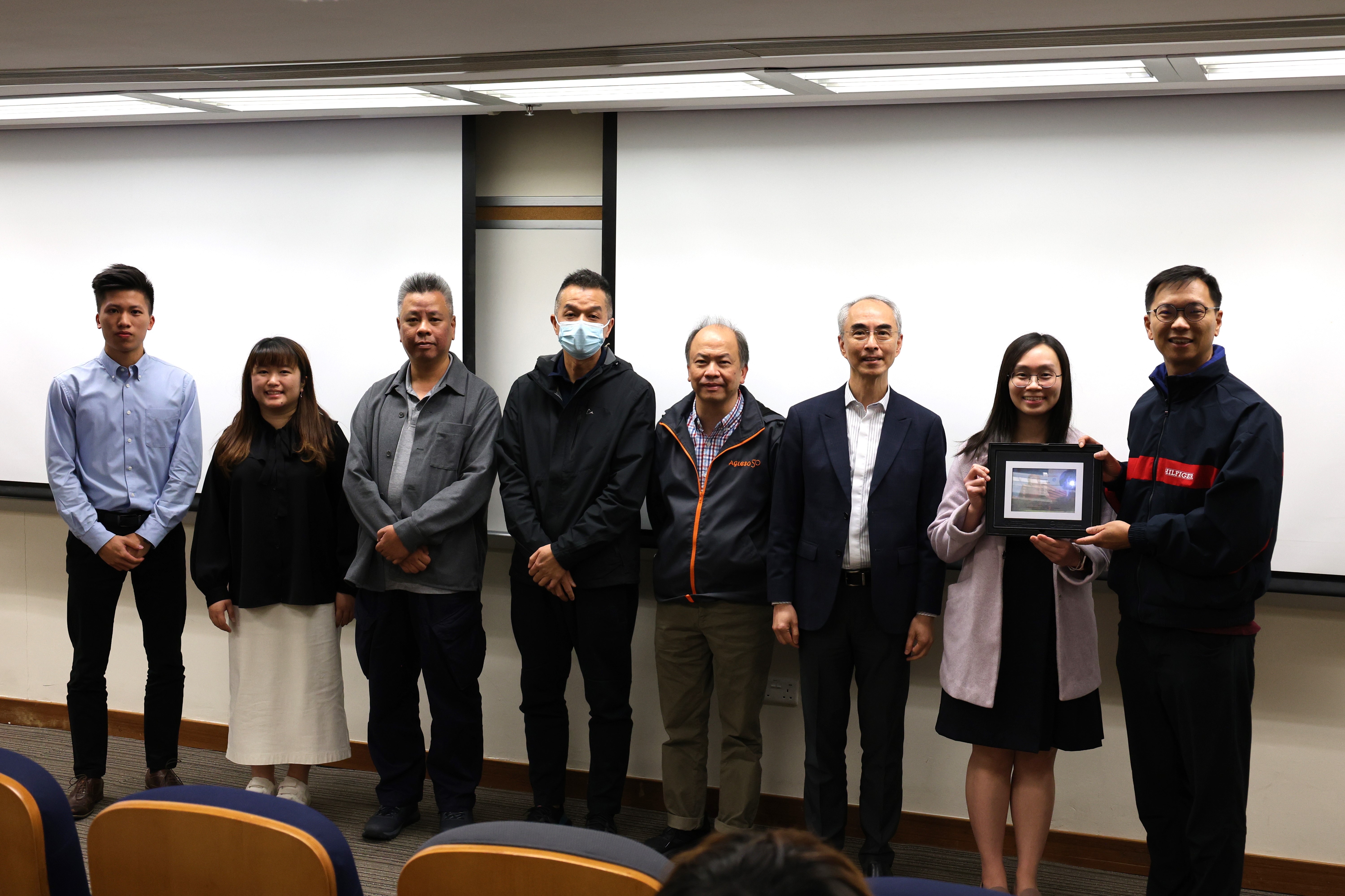 Group photo with government sector and Prof. Wallace Lai