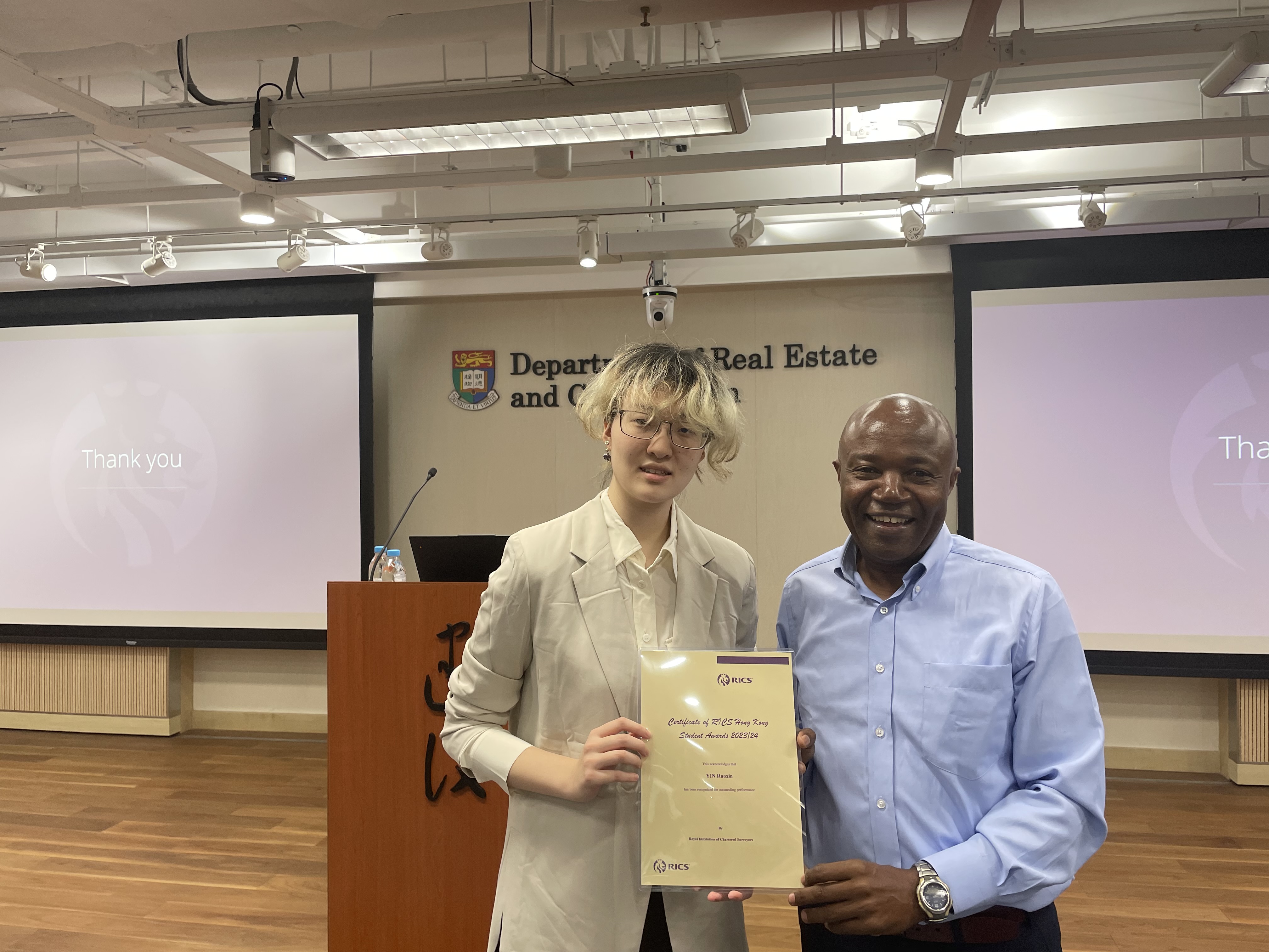 Prof Joseph AWANGE (on the right) shared the joy with the awardee, LSGI BSc Year 2 student YIN Ruoxin.