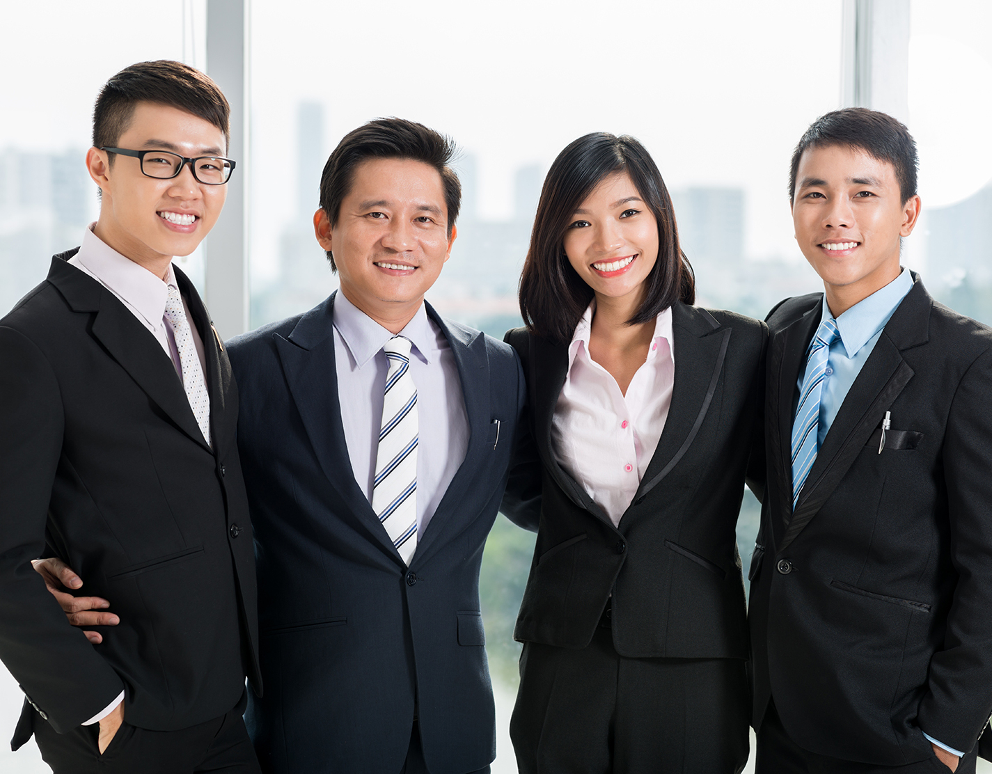 group photo of people in suit